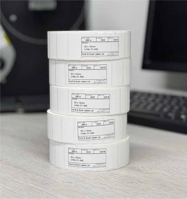 Close-up of professionally labeled laboratory vials in an ultra-cold environment.