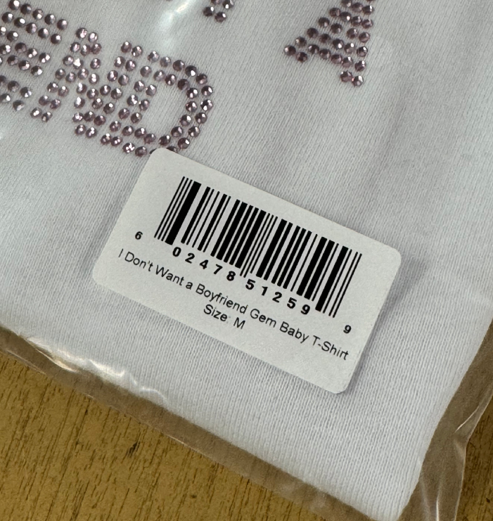 EAN-13 barcode label applied to garment packaging